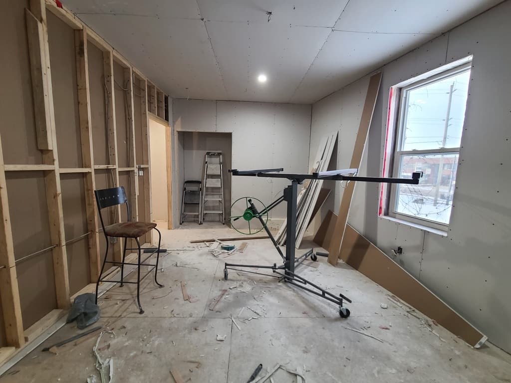 Drywall installation and finishing work on a Niagara renovation