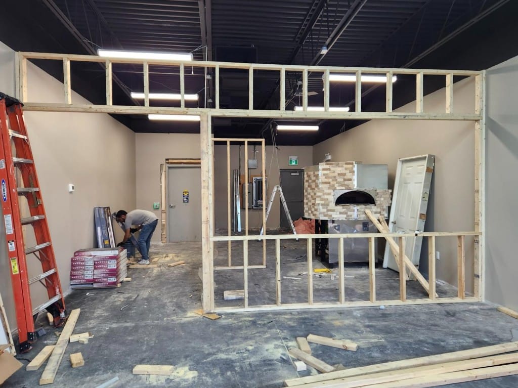 Interior partition framing in a commercial renovation space