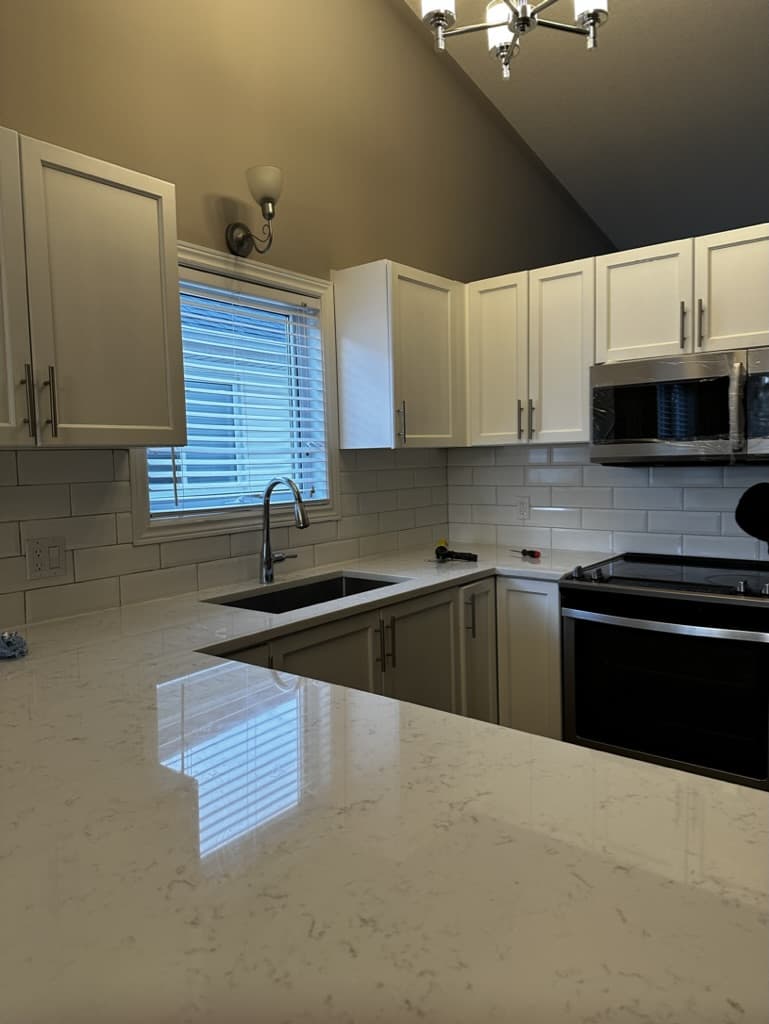 Updated kitchen with modern cabinets and finishes