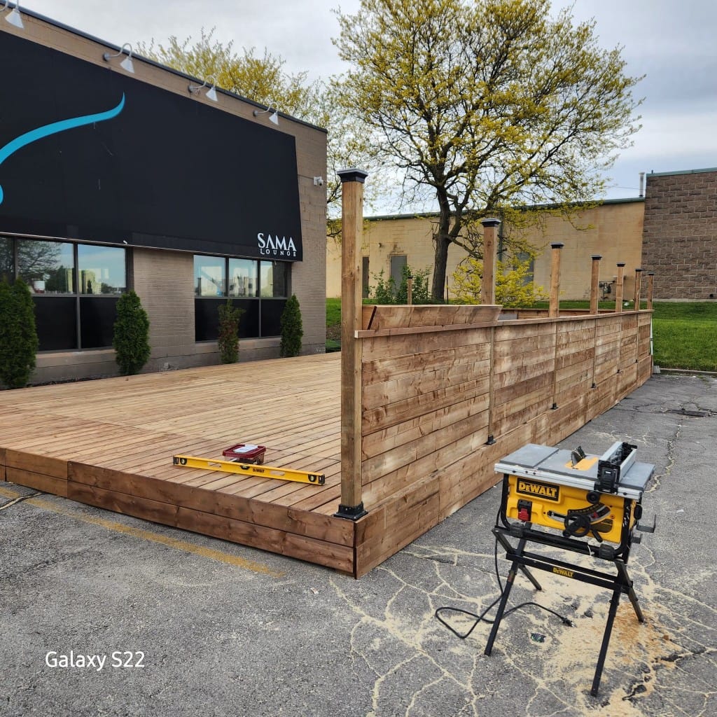 Commercial deck platform and privacy wall during construction